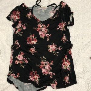Short sleeve black floral shirt.